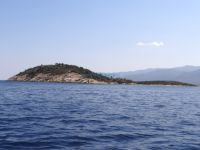 The small island Agios Isidodoros in the bay of Vourvourou, Chalkidiki