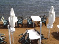 Tables right by the sea in Porto Koufo on the second leg of Chalkidiki