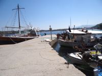 Fish boats and vessels at the port of Ormos Panagias