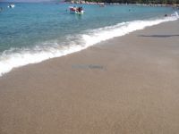 Thick sand and crystal clear waters on the Armenistis beach in Sithonia, Chalkidiki