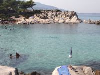 The enchanting colours of the waters attract thousands of visitors in Kavourotripes, Sithonia