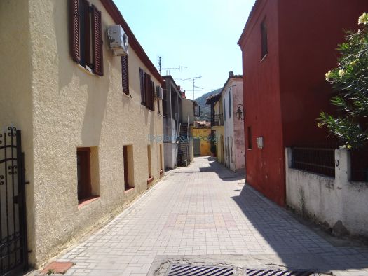 Narrow alley with traditional houses in Sykia, Sithonia, Chalkidiki