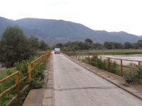 The bridge over Strymonas river in the village of Vironeia can fit only one car