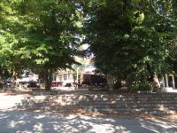 The square of Kato Poroia with shadow and trees