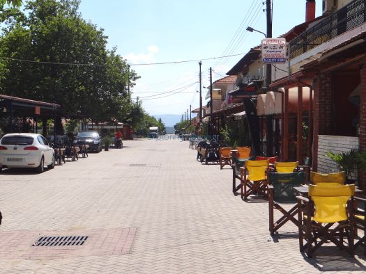 Pedestrian road with cafes and restaurants in Kastanoussa, Serres