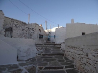 Uphill streets and traditional structures in Kastro, Sikinos
