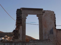 Abandoned construction with marble door in Chora, Sikinos