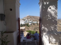 The entrance of the church of Agios Vasileios in Chorio and views to Kastro
