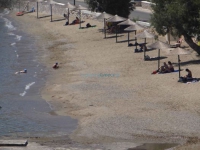 The Finikas beach with sand and shallow waters