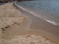 Fine sand and shallow waters on the beach of Galissas