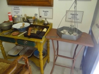 The tools of the coffeehouse owner and barber in the Exhibition of Traditional Occupations in Ano Syros