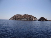 The islet Varvarousa in northwest Syros