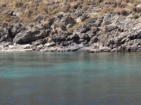 Crystal clear waters on the beach Grammata in north Syros