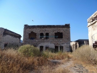 Deserted buildings in the old quarantine house, opposite of Hermoupolis